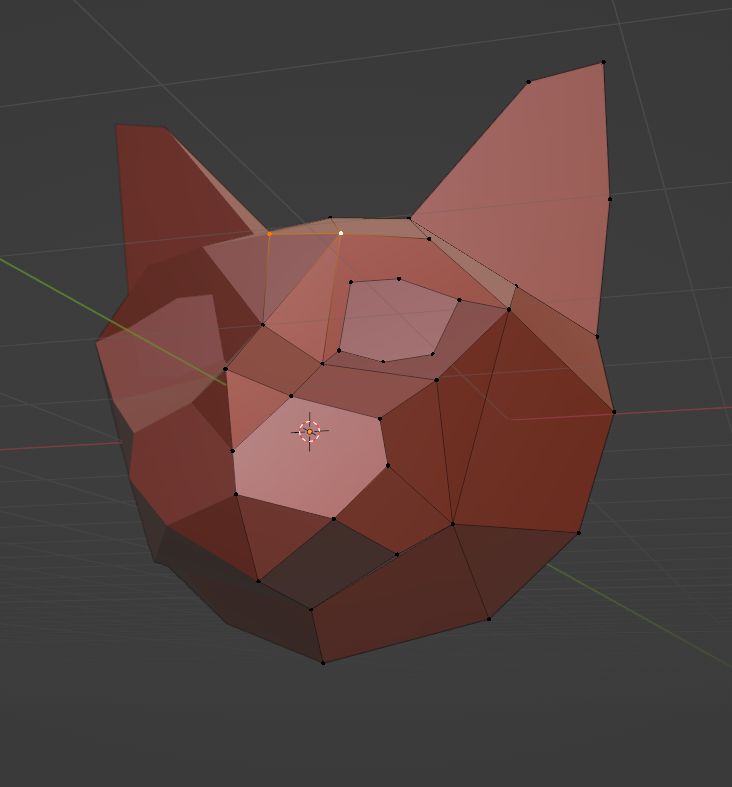 WIP: low poly cat's head. It is missing eyes and is untextured.